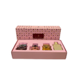 Original fragrance bottle and packaging on neat square photo